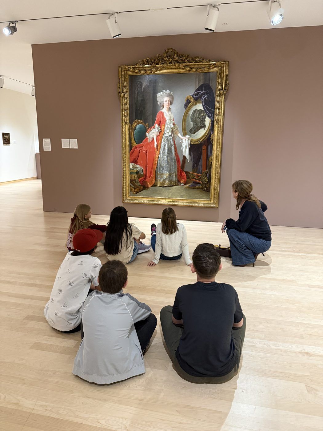 Phoenix Art Museum — students seated before an 18th-century portrait
