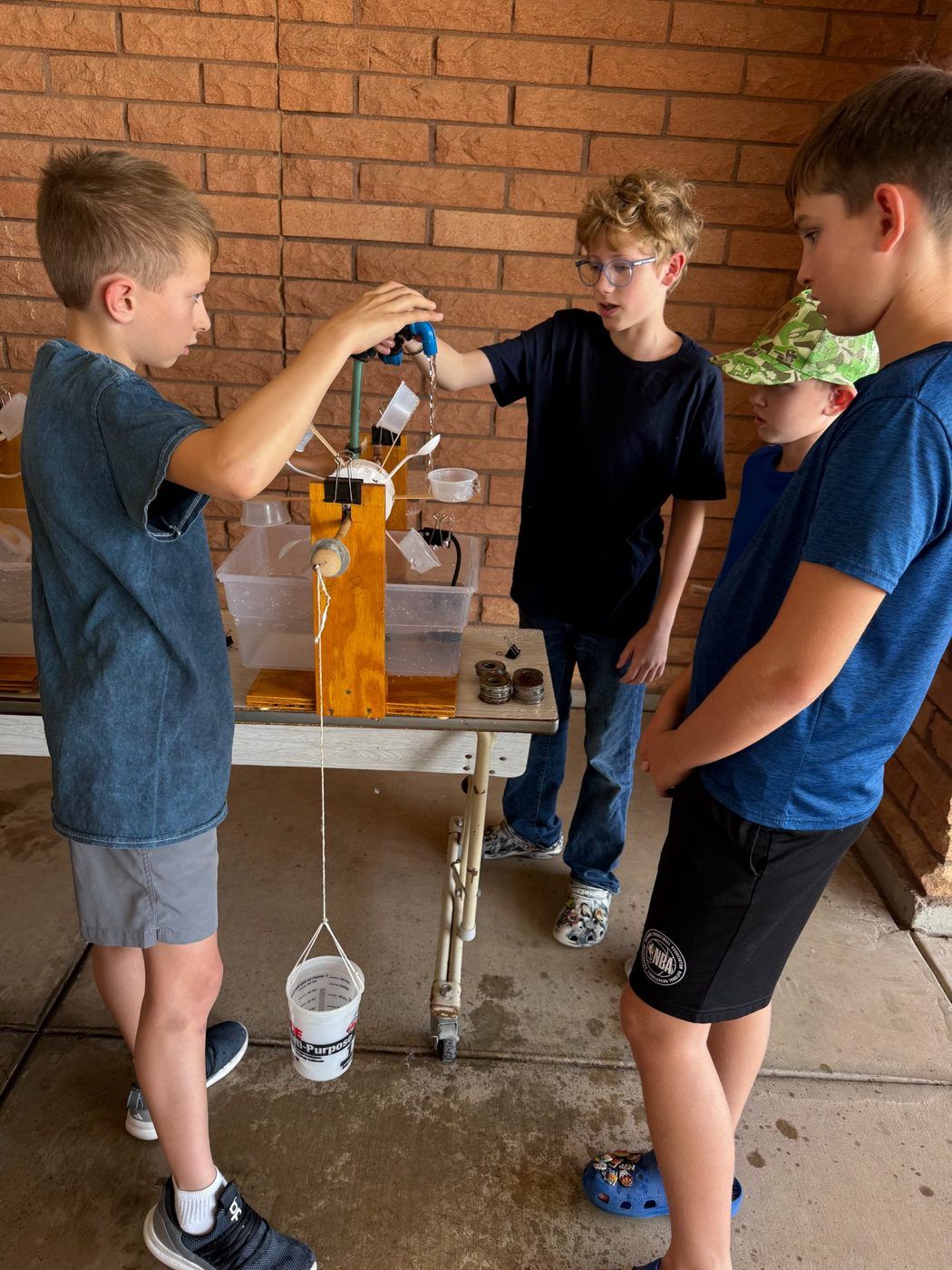Arizona Science Lab — students testing a pulley system