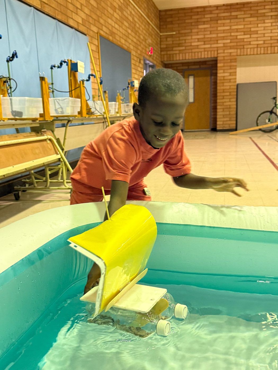 Arizona Science Lab — student launching a sailboat
